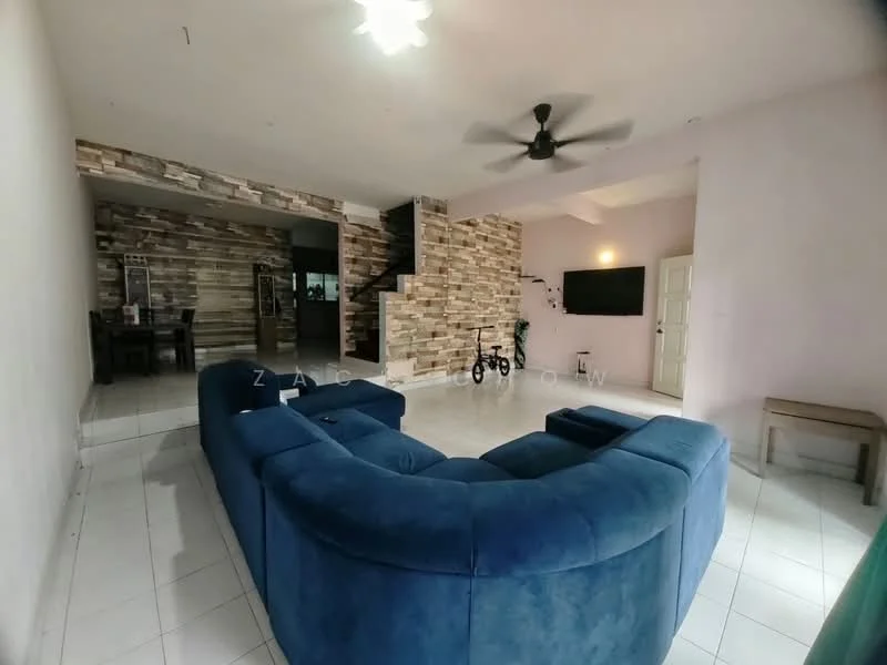 Living features: blue fabric L-shape sectional sofa, white tiled flooring, exposed stone accent wall, ceiling fan with light, wall-mounted TV, light pink painted walls, recessed ceiling lights, open layout to dining area, staircase with wooden steps, decorative wall with stone cladding; style: modern.