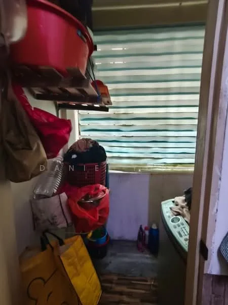 Laundry features: washing machine, shelves for storage, plastic storage bins, various bags, striped window blinds, bamboo flooring, clothes hanging, laundry basket.