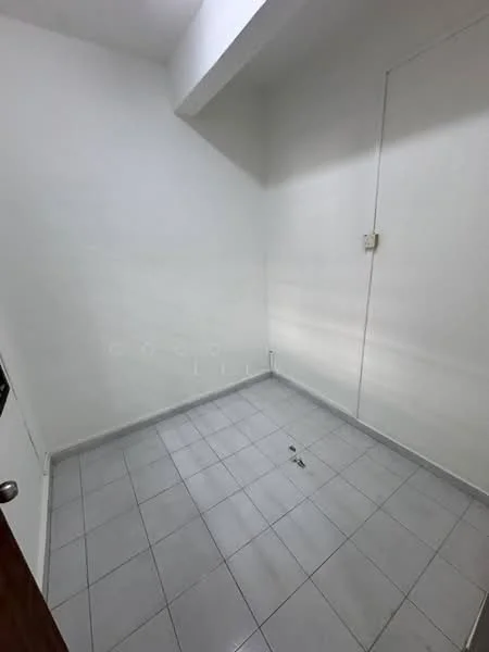 Room features: white painted walls, grey tiled flooring, single door, no visible windows, minimal decor; style: minimalist.