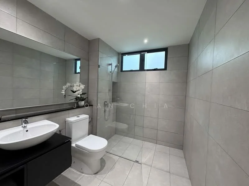 Bathroom features: grey tile walls, white ceramic floor tiles, single-sink vanity with round basin, chrome basin mixer faucet, wall-mounted toilet, walk-in shower with glass enclosure, rain shower head, large mirror above vanity, window for natural light, decorative plant on vanity; style: modern.