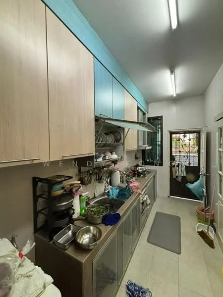 Kitchen features: light wood cabinetry, blue accent cabinetry, stainless-steel countertop, built-in oven, freestanding gas range, stainless-steel sink, chrome pull-down faucet, ceramic tile flooring, recessed ceiling lights, open shelving, dish rack, various kitchen utensils, door leading outside; style: modern.