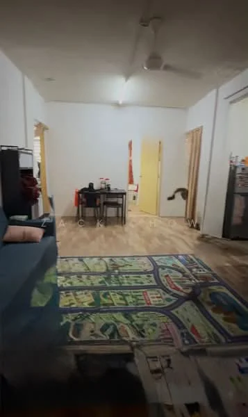 Room features: wooden flooring, white painted walls, ceiling fan, dining table with chairs, sofa, area rug with map design, doorway leading to another room, refrigerator visible in background.
