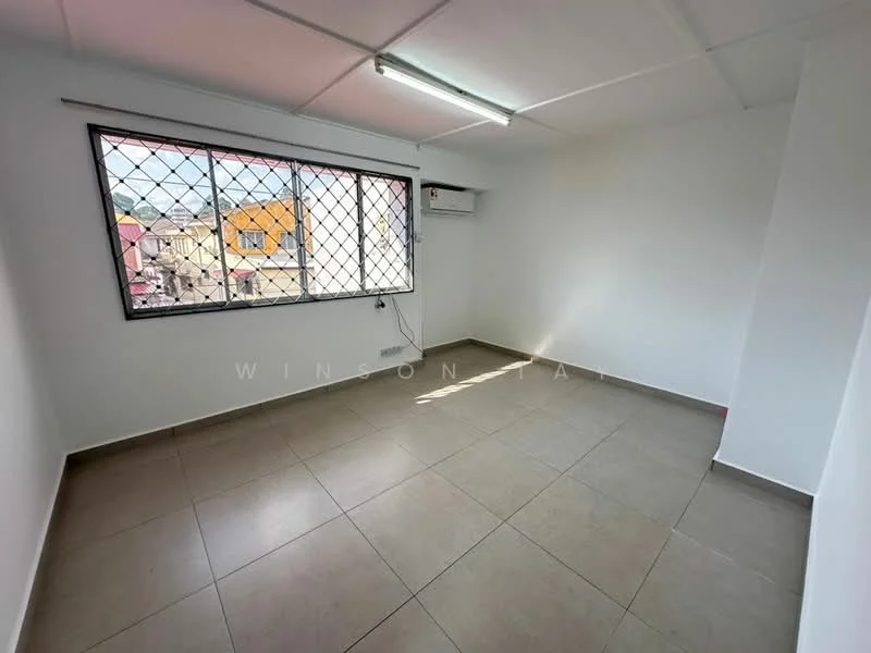 Room features: white painted walls, tile flooring, window with security grille, air conditioning unit, natural light from window, plain ceiling, no visible furniture, corner location; style: minimalist; view: city.