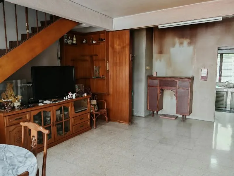 Living features: wooden staircase, wooden cabinetry, glass display cabinet, television unit, marble dining table, cream tiled flooring, wall-mounted air conditioning unit, decorative figurines on shelves, wooden chair, wooden side table; style: traditional.