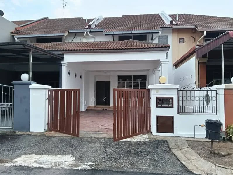 Exterior type: linked terrace house; features: white painted facade, red tiled roof, front gate with wooden slats, paved driveway, manicured front yard, covered car porch, security gate, window grilles, porch area, two-storey structure; style: modern.