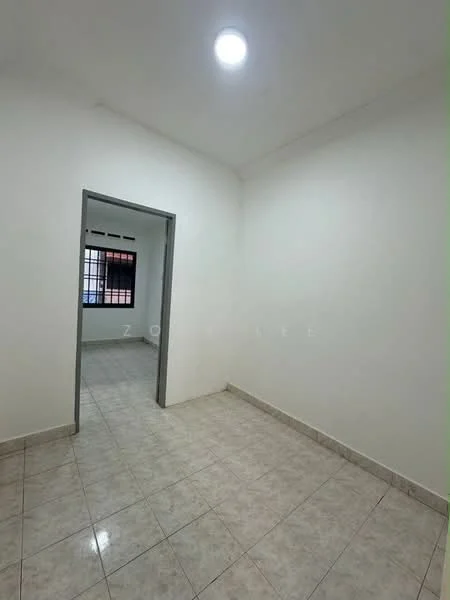 Room features: white painted walls, tile flooring, recessed ceiling light, window with black grille, doorway leading to another room, neutral color scheme, no visible furniture, empty space; style: minimalist.