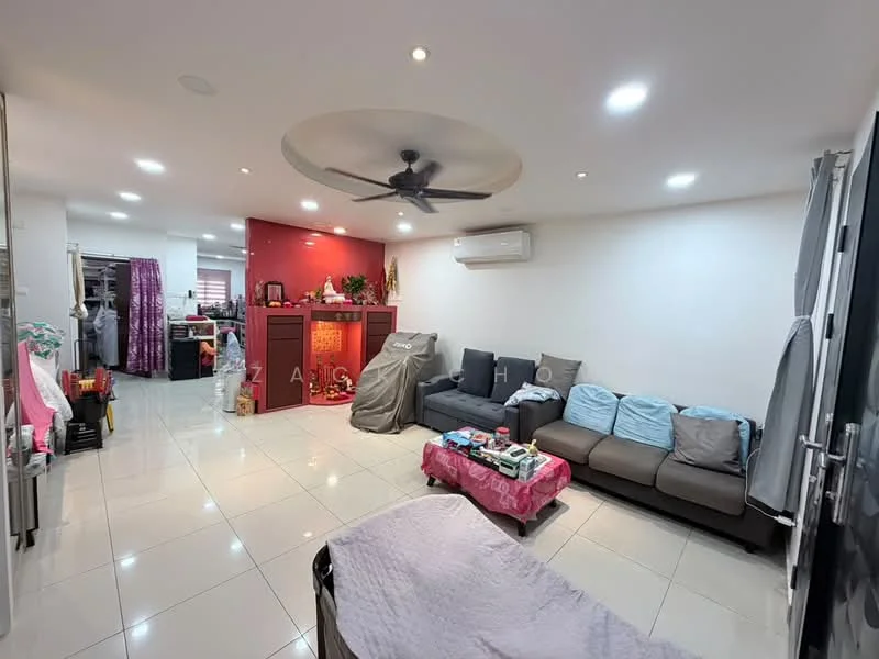 Living features: grey fabric 3-seater sofa, 2 grey armchairs, pink tablecloth on coffee table, white tiled flooring, recessed downlights, 5-blade ceiling fan, wall-mounted air conditioning unit, red accent wall, decorative wooden partition, decorative items on partition; style: modern. Room features: open layout to kitchen area, additional seating area, visible kitchen appliances.