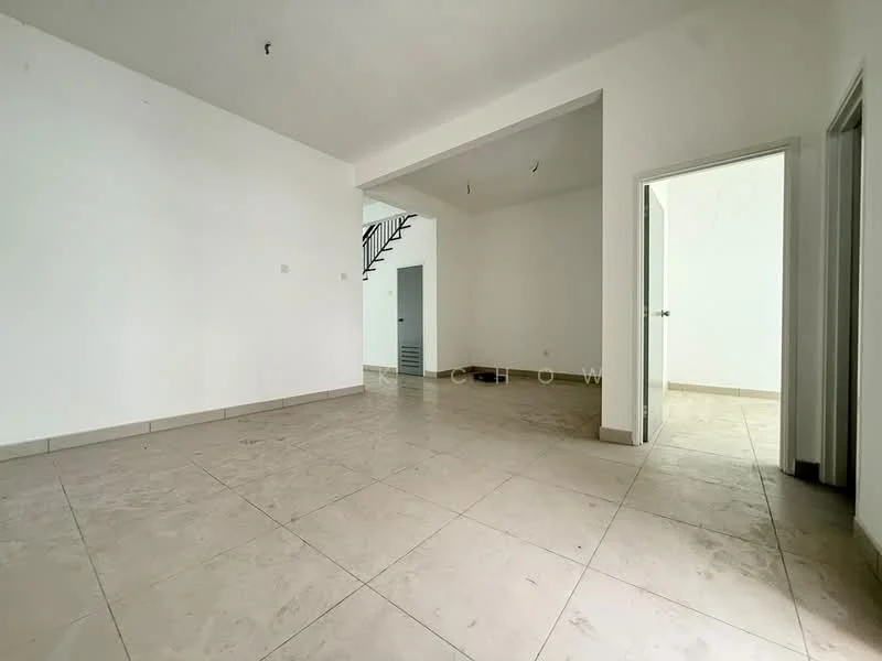 Room features: white painted walls, tile flooring, open layout, staircase visible in background, doorway leading to another room, natural light from windows, no visible furniture, neutral color scheme; style: modern.