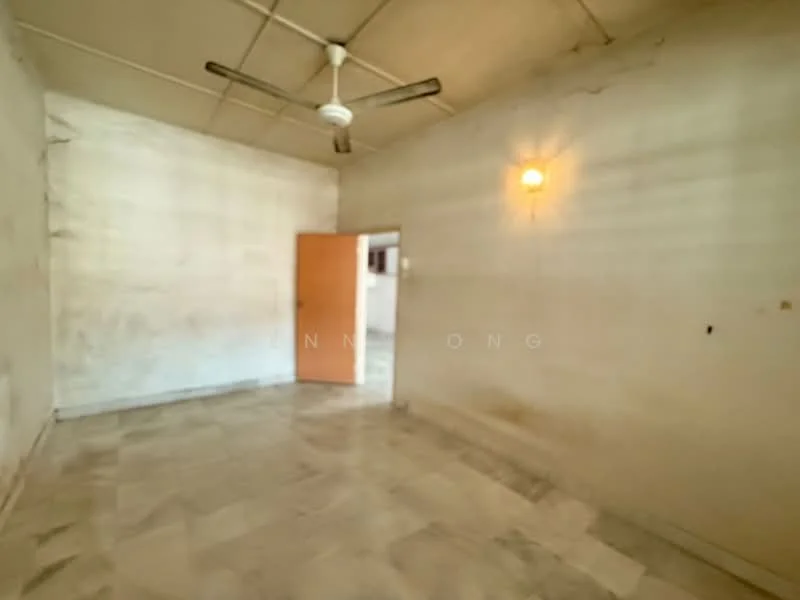 Room features: white painted walls, marble flooring, ceiling fan, single wooden door, light fixture on wall.