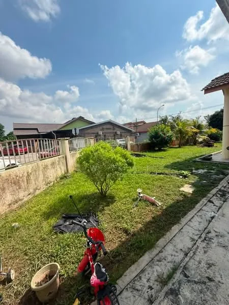 Exterior type: detached bungalow; features: manicured lawn, mature trees, paved walkway, fenced yard, garden area, outdoor space with grass, visible neighboring houses, clear blue sky, sunny weather; style: modern.