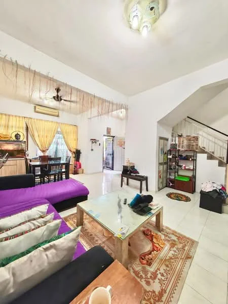 Living features: 3-seater fabric sofa in purple, 2-seater fabric sofa in beige, coffee table with glass top, area rug with geometric pattern, wall-mounted ceiling light, white painted walls, tile flooring, decorative wall hanging, window with sheer curtains, open layout to dining area; style: modern. Dining features: wooden dining table for 6, black dining chairs, window with sheer curtains, white painted walls, tile flooring; style: modern.