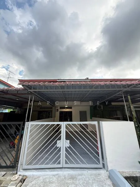 Exterior type: linked terrace house; features: red pitched tile roof, white painted facade, metal gate with geometric pattern, concrete driveway, covered porch area, surrounded by greenery; style: modern.