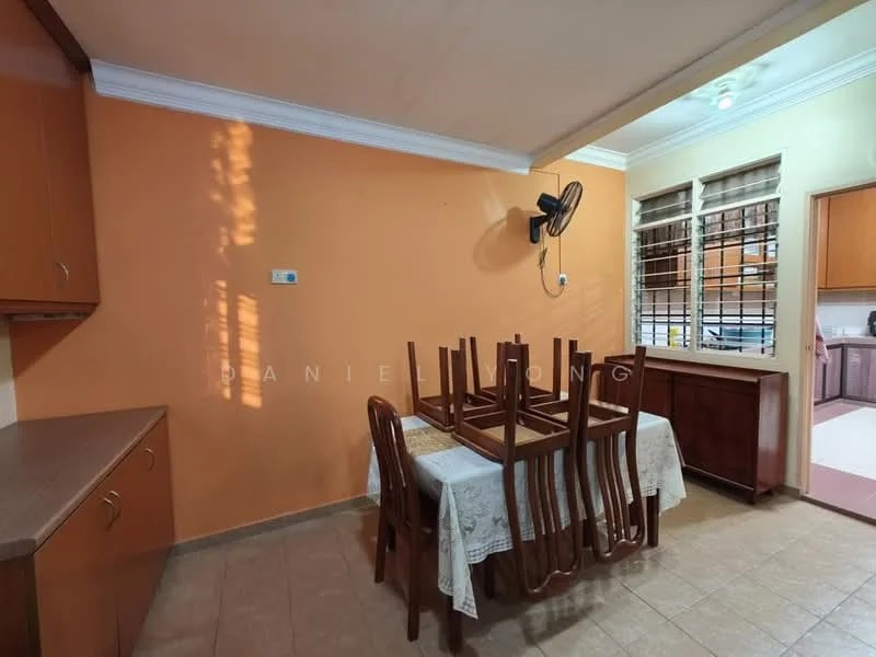 Dining features: orange painted walls, tile flooring, wooden dining table, wooden dining chairs, ceiling fan, window with grilles, built-in wooden cabinetry, countertop, light fixture. Kitchen features: wooden cabinetry, countertop, tile flooring, window with grilles.