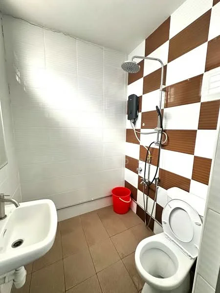 Bathroom features: white tiled walls, brown checkered accent wall, shower with overhead rain shower head, wall-mounted water heater, single-basin sink, chrome faucet, toilet, tile flooring, red plastic bucket; style: modern.
