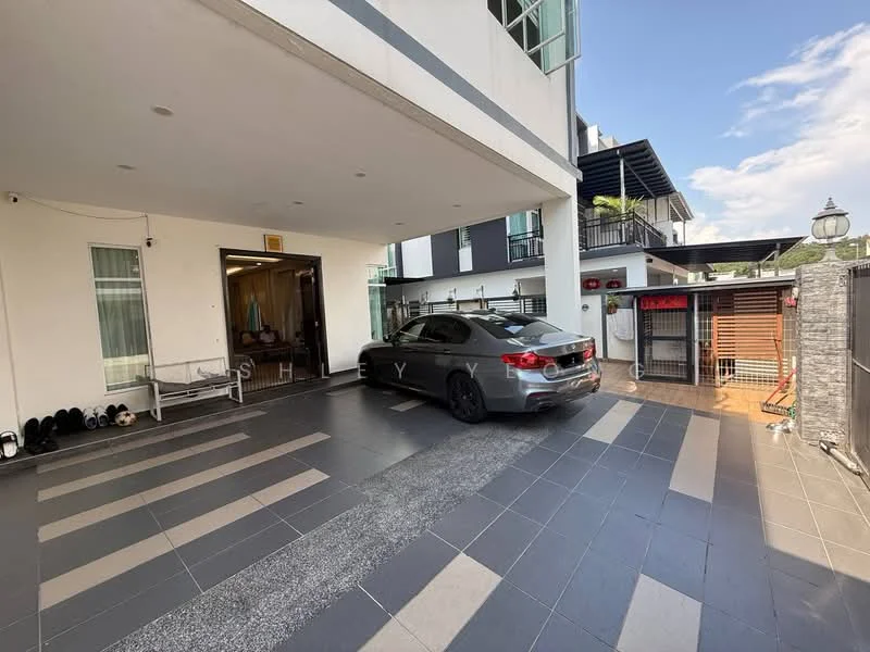 Exterior type: detached bungalow; features: flat roof, white painted facade, large windows, paved driveway, car porch with awning, manicured landscaping, security gate, outdoor lighting, surrounded by greenery; style: modern.