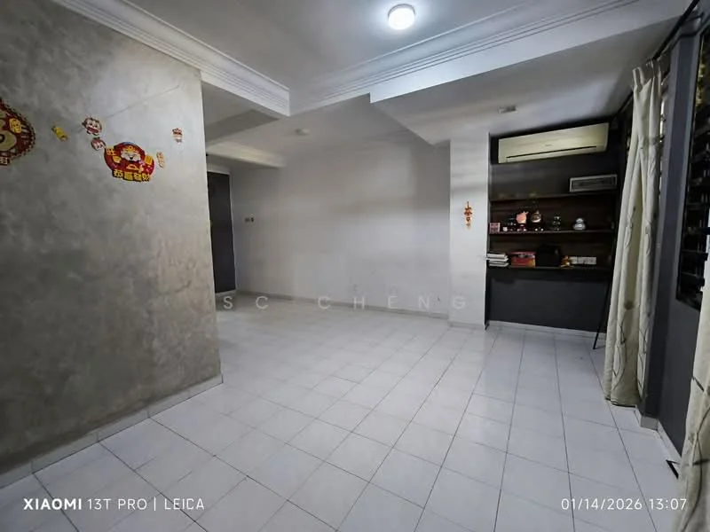 Living features: grey painted walls, white ceiling with recessed lighting, white floor tiles, air conditioning unit, open layout, curtains on window, decorative wall decals, kitchenette area with countertop; style: modern.