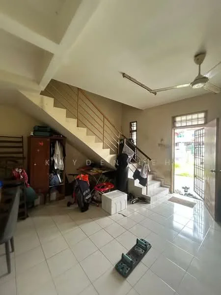 Room features: white painted walls, ceramic tile flooring, ceiling fan, staircase with metal railing, wooden storage cabinet, open space layout, door leading outside, natural light from window, coats and bags on hooks, cooler box, skateboard on floor; style: modern.