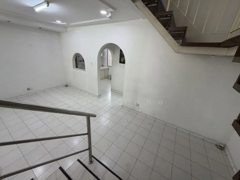 Room features: white painted walls, white tiled flooring, staircase with wooden railing, arched window, recessed ceiling lights, open space layout, corner wall with window, no visible furniture; style: minimalist.