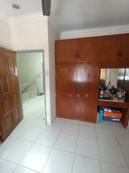 Room features: white painted walls, tile flooring, wooden door, built-in wooden wardrobe, desk with storage, light fixture on ceiling, window with natural light, neutral color scheme; style: modern.
