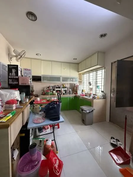 Kitchen features: green cabinetry, white upper cabinets, stainless-steel sink, chrome faucet, ceramic tile flooring, countertop with appliances, built-in oven, microwave, refrigerator, window with metal grille, trash bin, kitchen table, various kitchen utensils, open shelving, wall-mounted fan; style: modern.