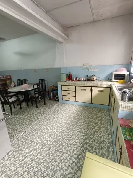 Kitchen features: yellow cabinetry, white countertop, stainless-steel sink, built-in microwave, freestanding stove, tile backsplash, checkered tile flooring, wall-mounted shelves, dining table with chairs, kitchen utensils visible, light blue painted walls, exposed ceiling beams; style: traditional.