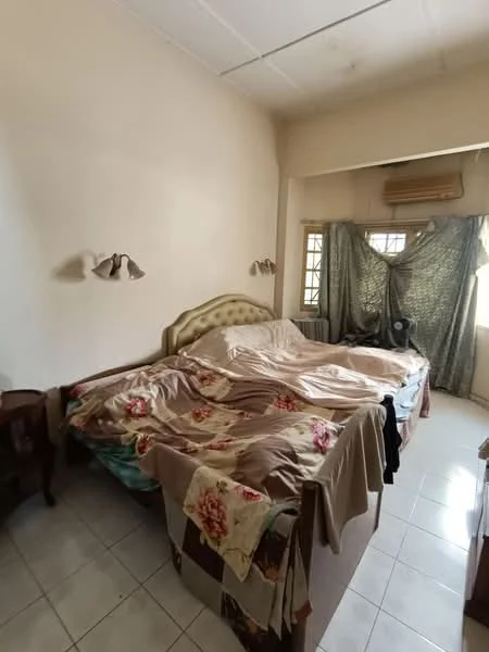 Bedroom features: king-size bed, upholstered headboard, bedside lamps, window with curtains, air conditioning unit, white tiled flooring, decorative bedspread with floral pattern, wooden bedside table.