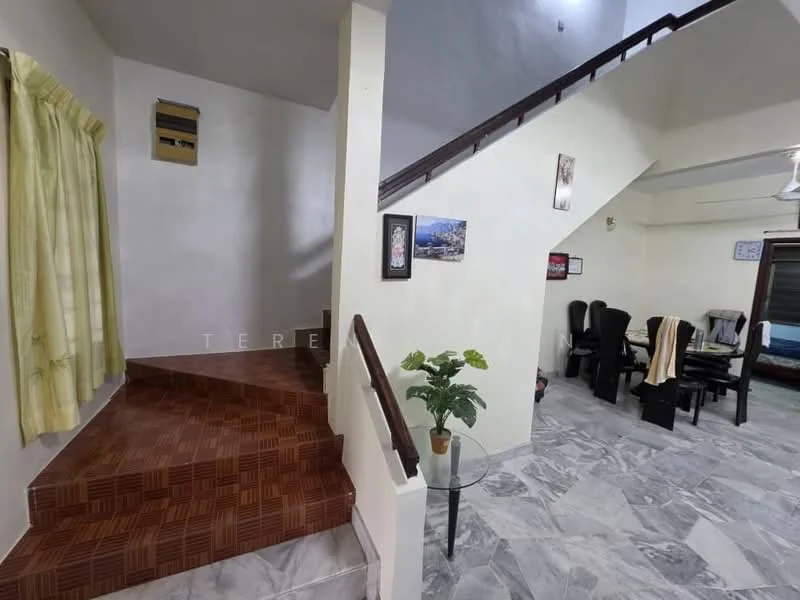 Room features: staircase with wooden railing, marble flooring, cream painted walls, large window with sheer curtains, decorative plant in ceramic pot, glass-top side table, dining area with black dining chairs, framed artwork on wall, light fixture on ceiling; style: modern.