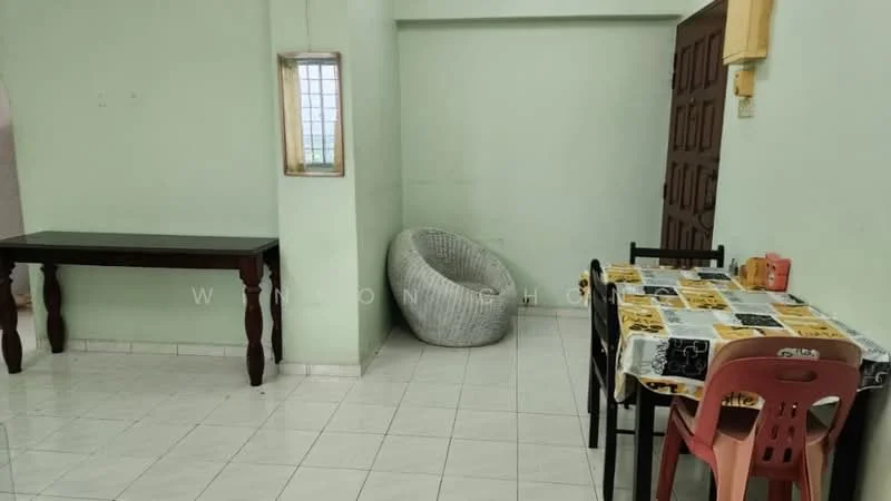 Dining features: green painted walls, white tiled flooring, wooden dining table, black dining chairs, round wicker chair, tablecloth with patterned design, window with grid pattern, light fixture, wooden door, corner space.