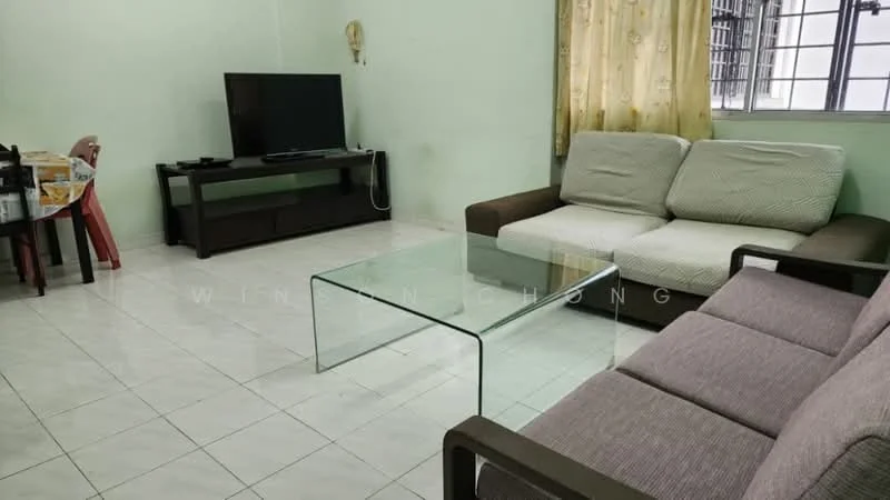 Living features: light green painted walls, white tiled flooring, 2-seater fabric sofa in beige, 3-seater fabric sofa in grey, glass coffee table, wall-mounted TV, curtains, windows with metal grills; style: minimalist.
