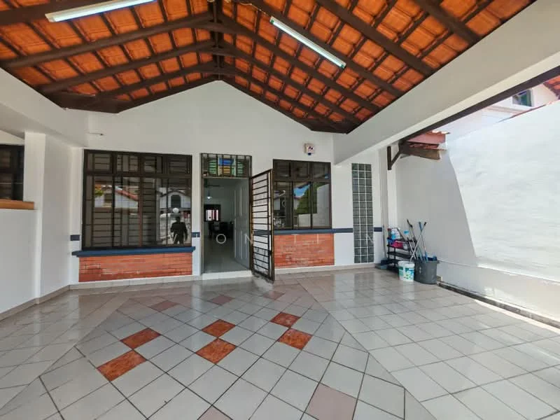 Room features: tiled flooring with decorative pattern, white painted walls, exposed wooden beams on ceiling, large windows with metal grills, brick accent wall, open layout, natural light from windows, clean and minimal decor; style: modern.