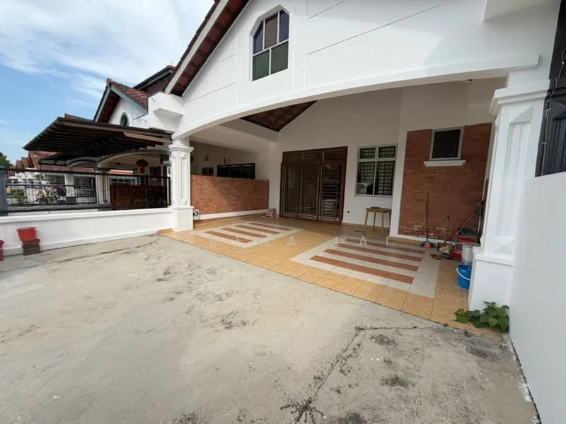 Exterior type: detached bungalow; features: white painted facade, brick accent wall, tiled flooring, covered porch area, sliding glass doors, manicured landscaping, paved walkway, gabled roof, outdoor seating area, fenced perimeter; style: modern.