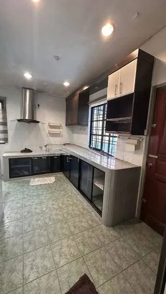 Kitchen features: L-shaped kitchen layout, white and black cabinetry, marble countertop, stainless-steel range hood, built-in oven, glass-front upper cabinets, black glass lower cabinets, single-bowl stainless-steel sink, chrome pull-down faucet, ceramic tile flooring in green, recessed downlights, window with grid pattern, door leading to exterior; style: modern.