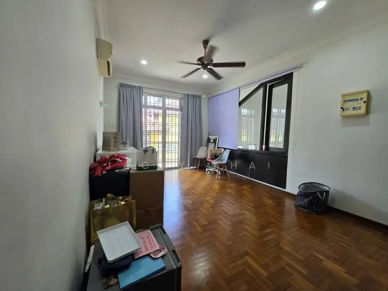 Living features: wooden flooring, white painted walls, ceiling fan, large windows, curtains, light switch, box storage, office chair, desk, decorative basket.