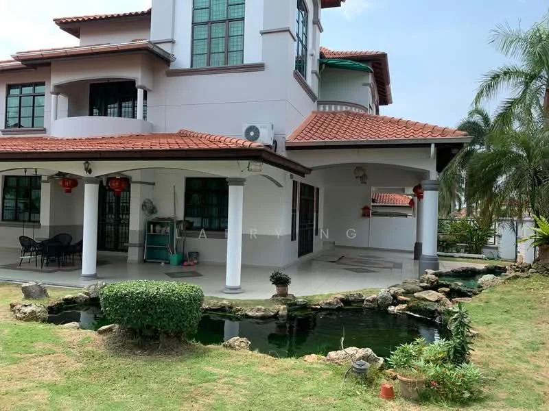 Exterior type: detached bungalow; features: red tiled roof, white painted facade, columns at porch, manicured lawn, landscaped garden with rocks, pond with water plants, outdoor seating area, air conditioning unit on wall, decorative lanterns, paved walkway; style: modern.