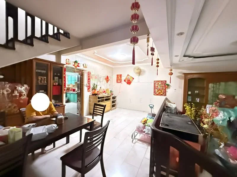 Dining features: dining table with chairs, white tiled flooring, decorative wall hangings, ceiling fan, recessed lighting, wooden cabinetry, open layout to kitchen, wall-mounted decorations, decorative lanterns, greenery in pots; style: traditional. Kitchen features: open kitchen layout, white cabinetry, kitchen appliances visible, green tiled backsplash, countertop space, sink, stainless-steel fridge; style: traditional.
