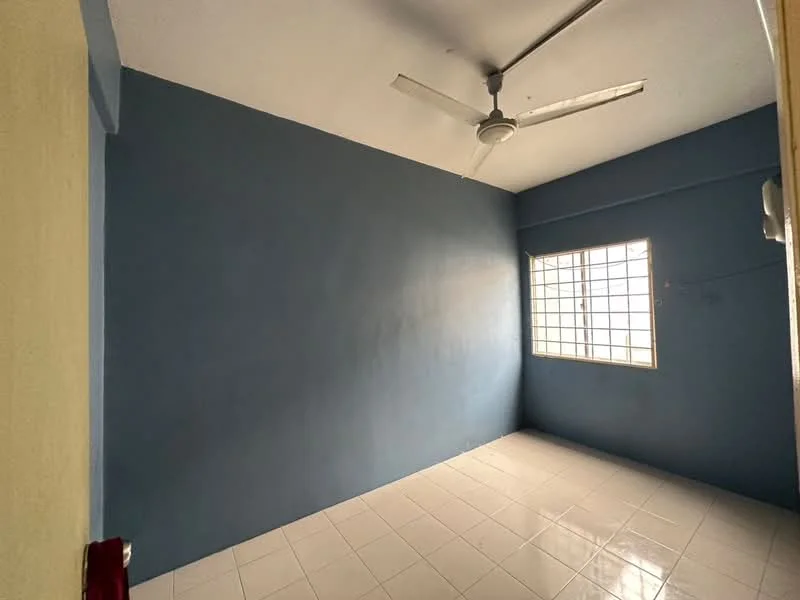 Room features: blue painted walls, white tiled flooring, ceiling fan, square window with grid, no visible furniture, neutral ceiling, single light fixture, corner of door frame visible.