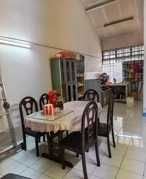Dining features: glass-top dining table, 6 wooden dining chairs, white tablecloth, decorative centerpiece, tiled flooring, white painted walls, built-in cabinetry, open shelving, window with grid pattern, overhead fluorescent lighting. Room features: work desk, plastic water bottle, ladder, storage containers.