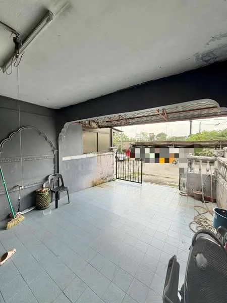 Room features: grey painted walls, blue tiled flooring, metal roof, open space, gate, broom, plastic chair, cleaning supplies, exposed ceiling, outdoor view.