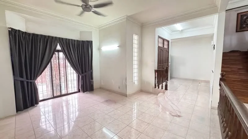 Living features: cream tiled flooring, white painted walls, ceiling fan, floor-to-ceiling windows, blackout curtains, natural light from windows, staircase visible in background, light fixture on wall.