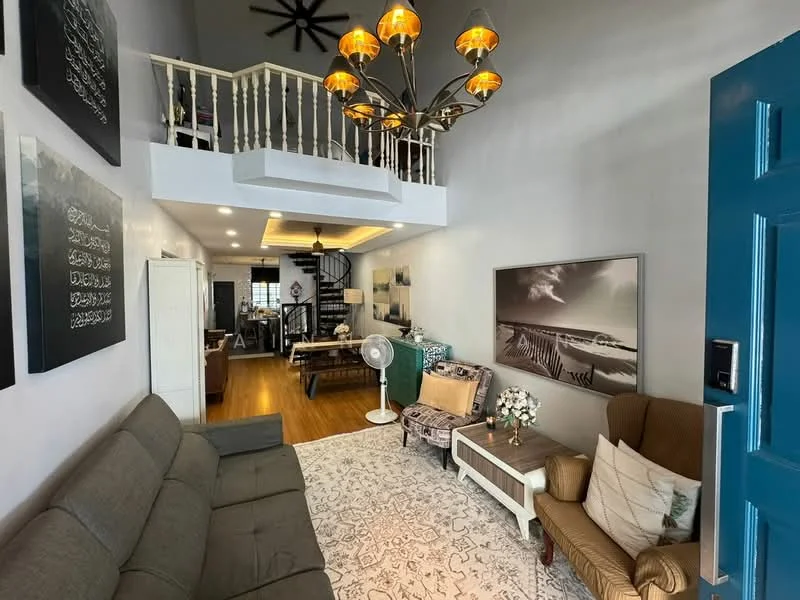 Living features: grey fabric sofa, 2-seater brown armchair, wooden coffee table, area rug with geometric pattern, chandelier with multiple bulbs, wall-mounted artwork, white painted walls, wooden flooring, ceiling fan, decorative flower arrangement, open staircase leading to upper level, large window with natural light; style: modern.