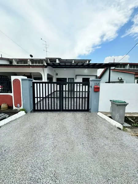 Exterior type: linked terrace house; features: black metal gate, gravel driveway, white painted facade, red accent wall, covered porch area, single-storey, visible mailbox, green waste bin, outdoor lighting, surrounding fence; style: modern.