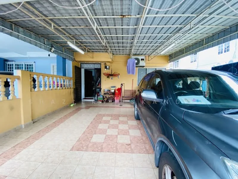 Exterior type: car porch; features: covered car porch, tiled flooring with checkerboard pattern, yellow painted walls, metal roof, open access to main entrance, decorative balustrade, utility items visible, parking space for one vehicle; style: modern.