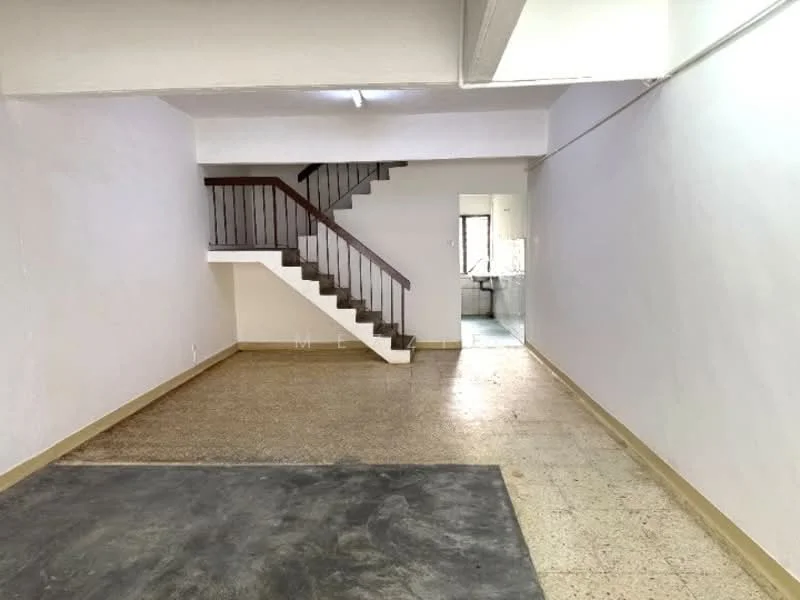 Room features: white painted walls, exposed concrete ceiling, terrazzo flooring, staircase with wooden railing, open layout, natural light from windows, neutral color scheme, no visible furniture; style: minimalist.