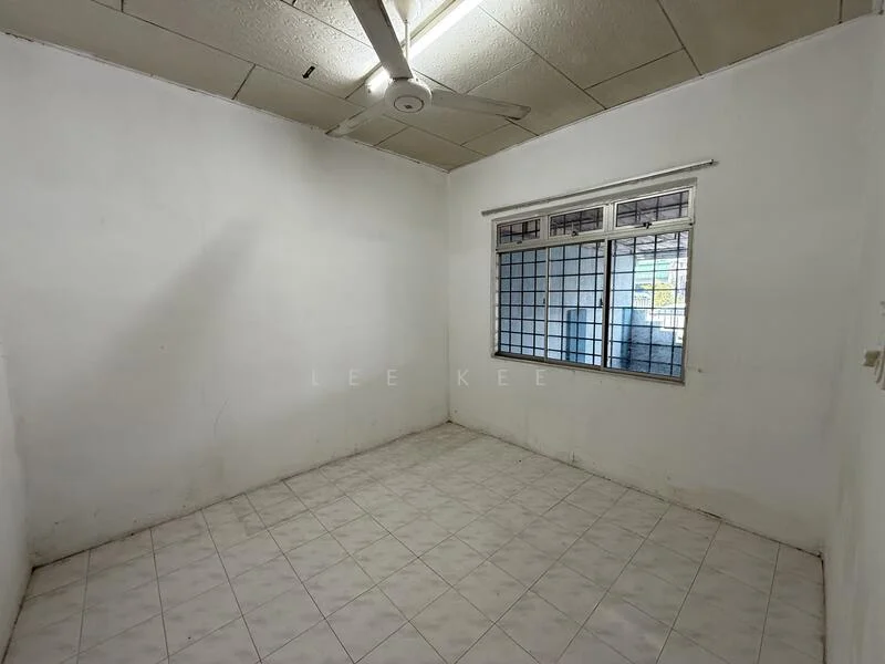 Room features: white painted walls, tile flooring, ceiling fan, window with metal grille, natural light from window.
