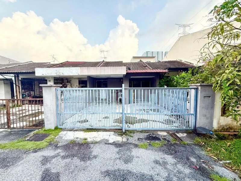 Exterior type: semi-detached house; features: blue metal gate, concrete driveway, manicured lawn, single-storey, red tiled roof, exposed brick facade, front porch, surrounded by greenery; style: traditional.