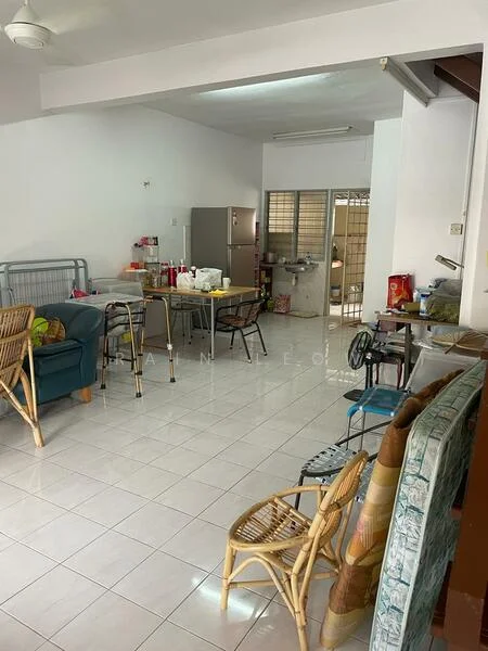 Room features: white painted walls, glossy white tile flooring, ceiling fan, refrigerator, dining table with chairs, sofa chairs, folding chairs, kitchen area visible in background, open layout, natural light from windows; style: modern.