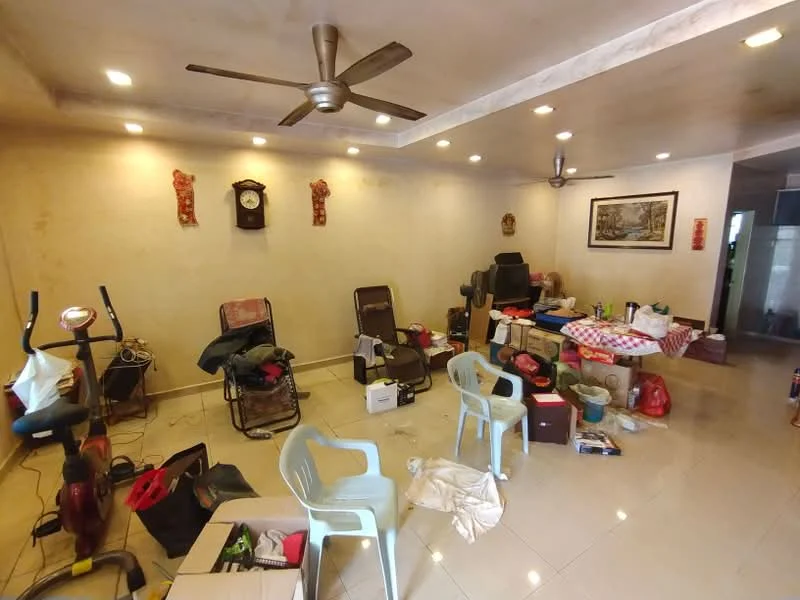 Living features: cream painted walls, recessed downlights, tray ceiling, polished tile flooring, 2 ceiling fans, exercise bike, folding chairs, various boxes and bags, decorative wall clock, framed artwork, seating area with armchairs.
