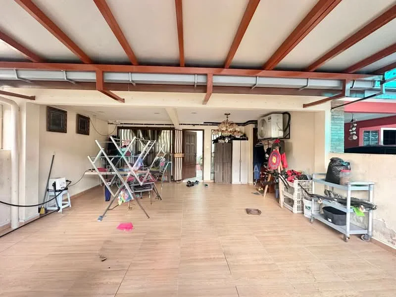 Room features: wooden ceiling beams, tile flooring, wall-mounted air conditioning unit, chandelier, clothes drying rack, open layout, decorative wall art, multiple storage carts, various household items scattered, large open space.