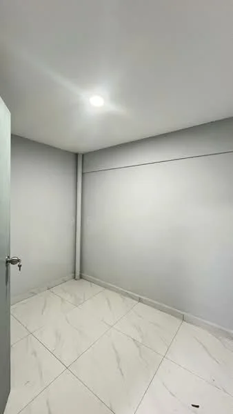 Room features: white painted walls, marble tile flooring, recessed LED downlights, single door, corner column, smooth ceiling; style: modern.
