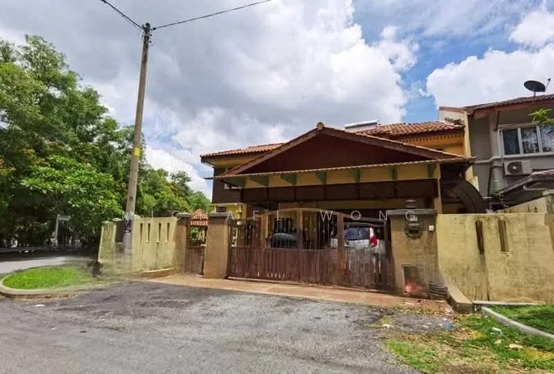 Exterior type: semi-detached house; features: cream painted facade, red tiled roof, wooden gate, fenced perimeter, two-storey structure, landscaped garden, driveway, mature trees, parking space, outdoor lighting; style: traditional.